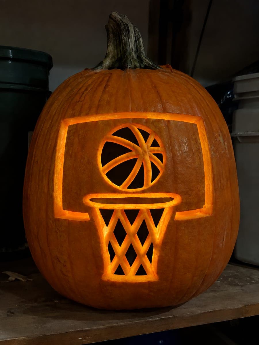 Basketball and Net Pumpkin on Garage Shelf