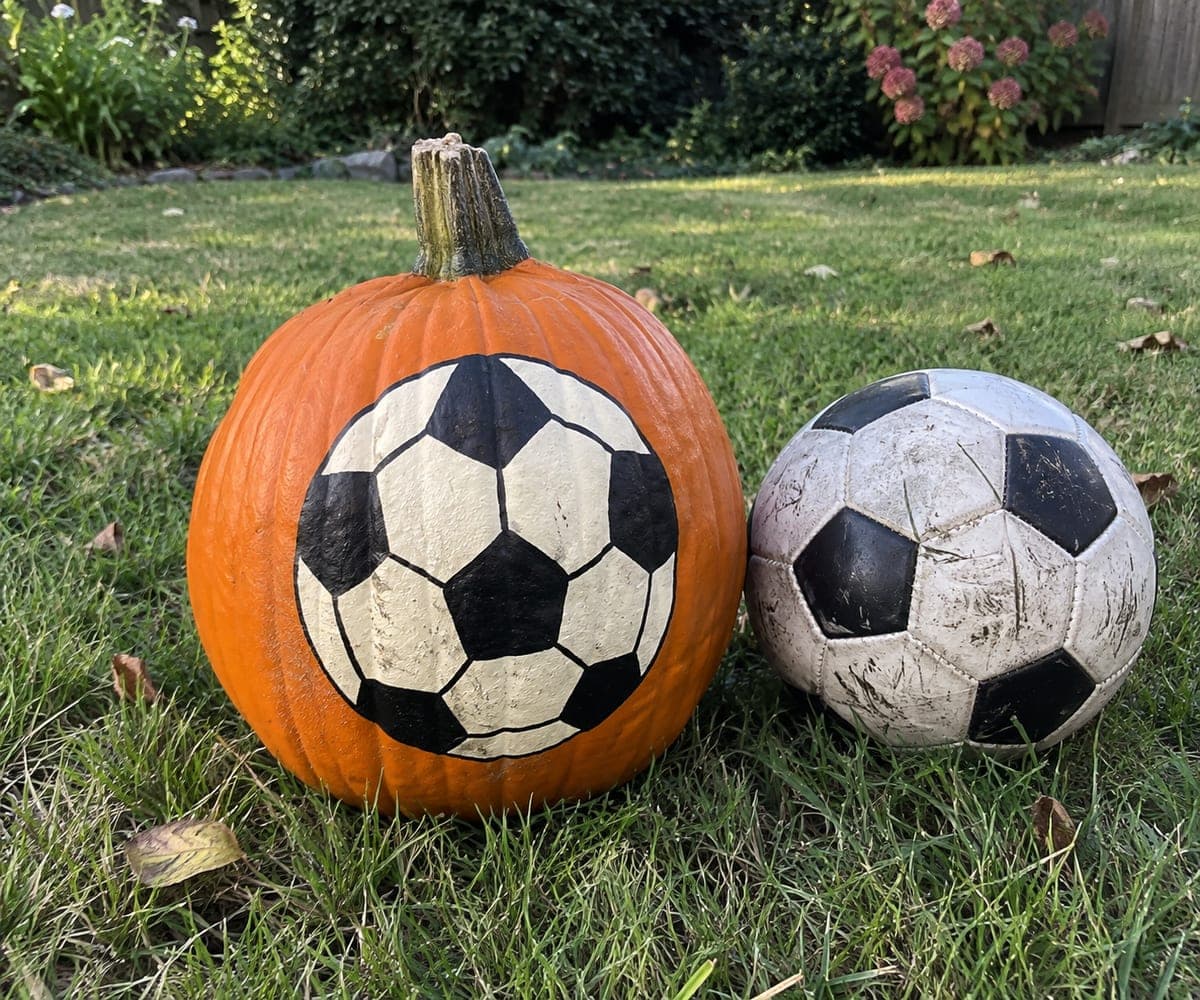 Black-and-Cream Soccer Ball Painted Pumpkin