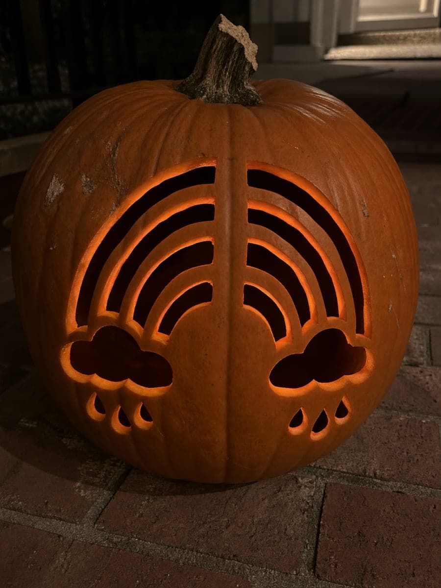 Detailed Rainbow Pumpkin With Clouds and Raindrop Apertures