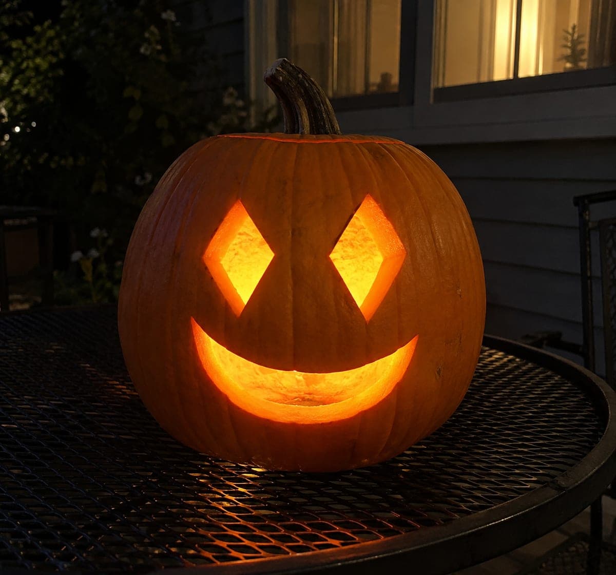 Diamond Eyes Crescent Mouth Geometric Pumpkin Design