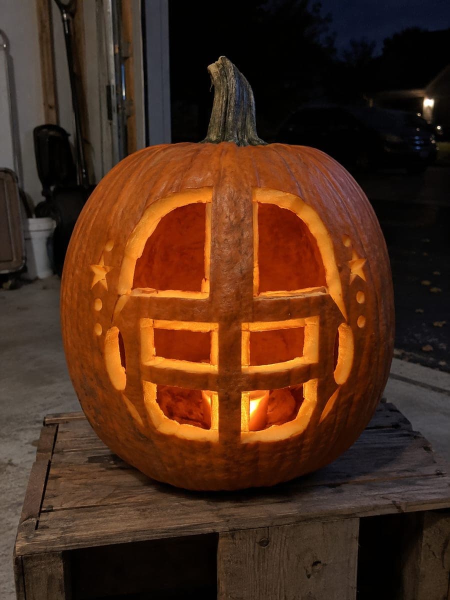 Expert Football Helmet Jack-O-Lantern With Face Mask