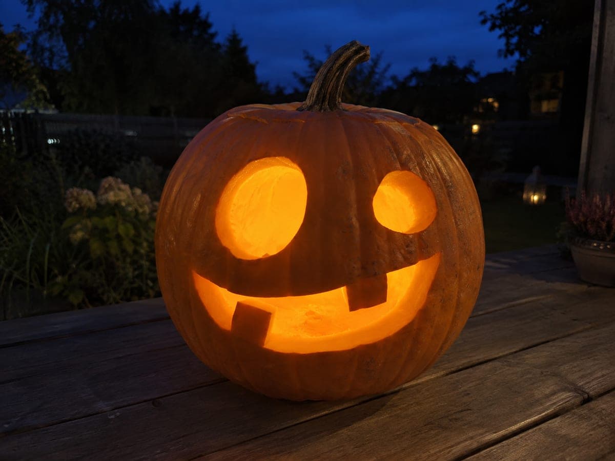 Funny Easy Pumpkin Carving With a Glowing Face Design