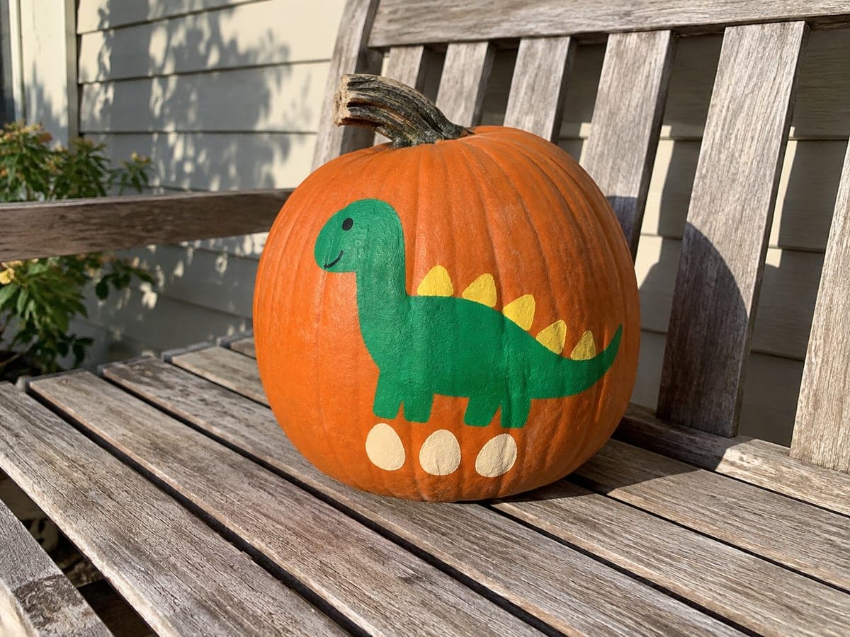 Green Dinosaur and Cream Eggs Painted Pumpkin
