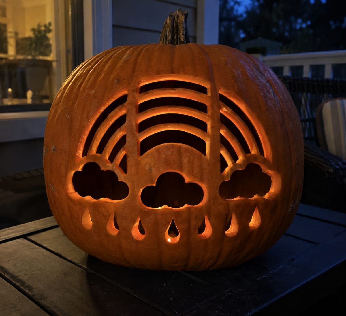 Intricate Segmented Rainbow Pumpkin With Glowing Cloud Arches