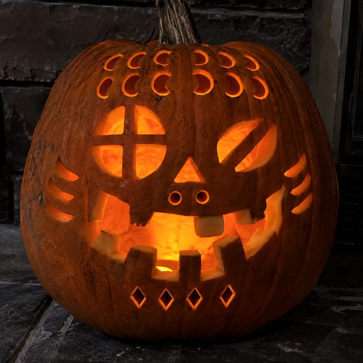 Intricate Zombie Pumpkin with Brain Cutouts and Eye Bars