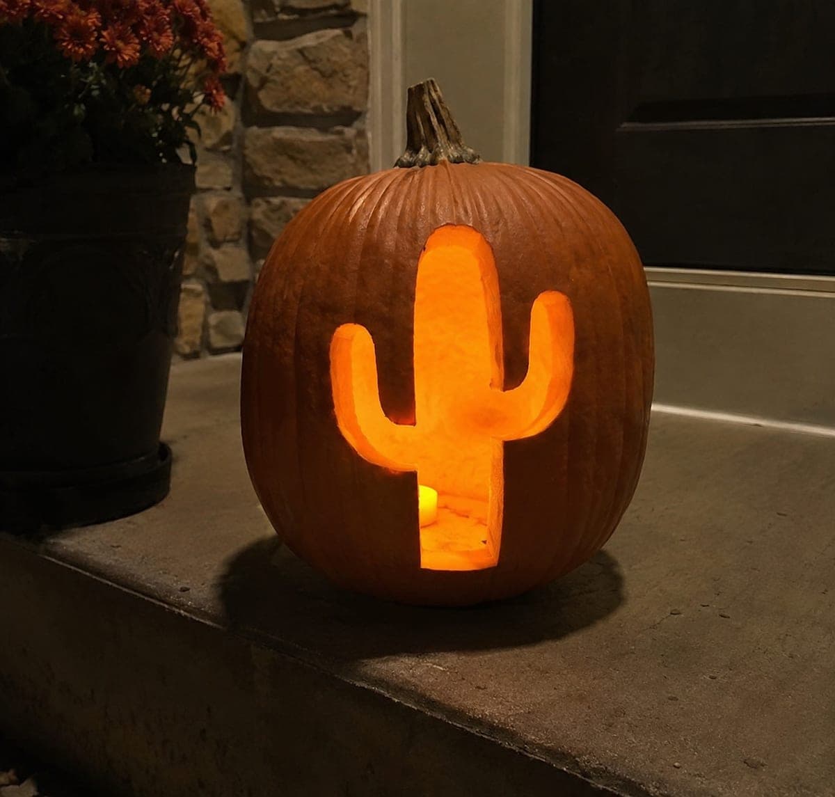Saguaro Cactus Silhouette Pumpkin on a Porch Step