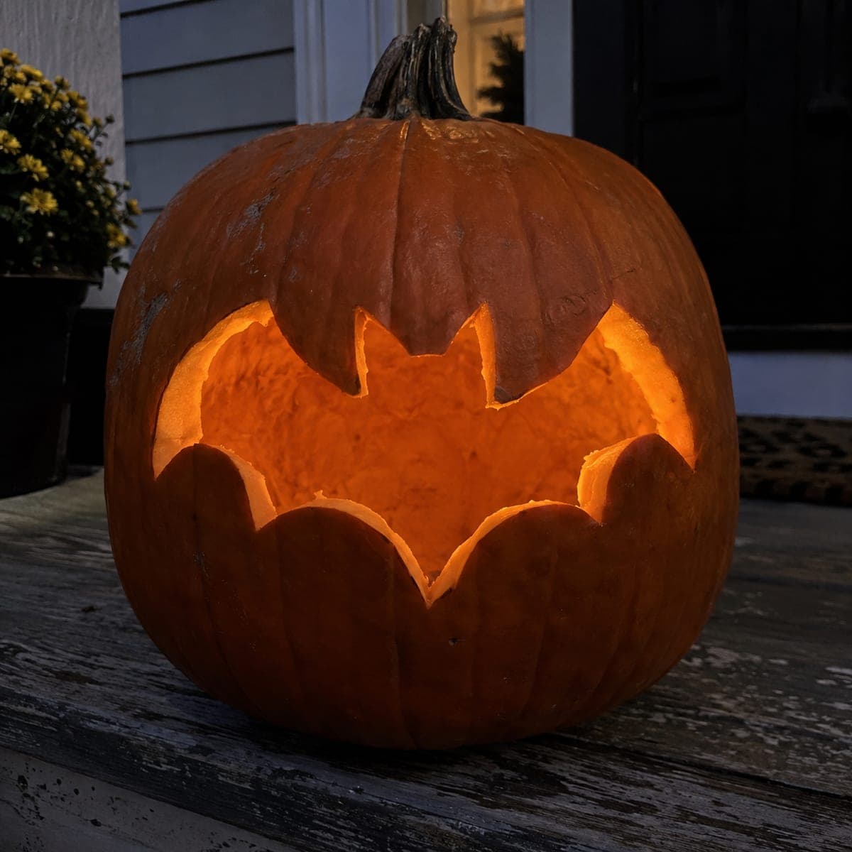 Simple Bat Silhouette Pumpkin Carving on Porch