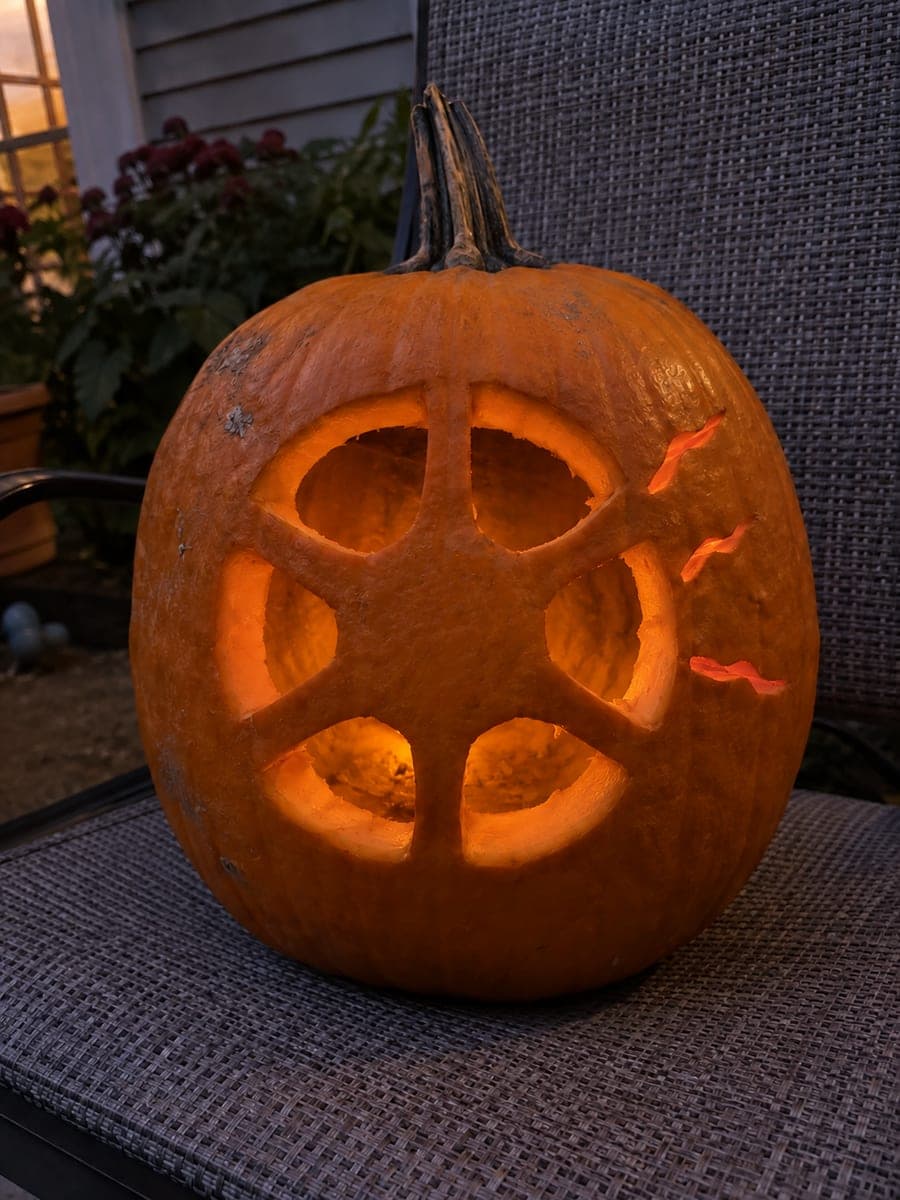 Six-Spoke Radial Eyeball Pumpkin on a Garden Chair