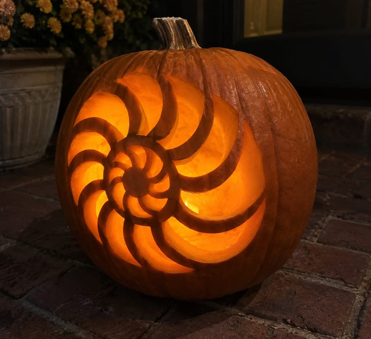 Spiral Seashell Pumpkin With Segmented Wedge Openings
