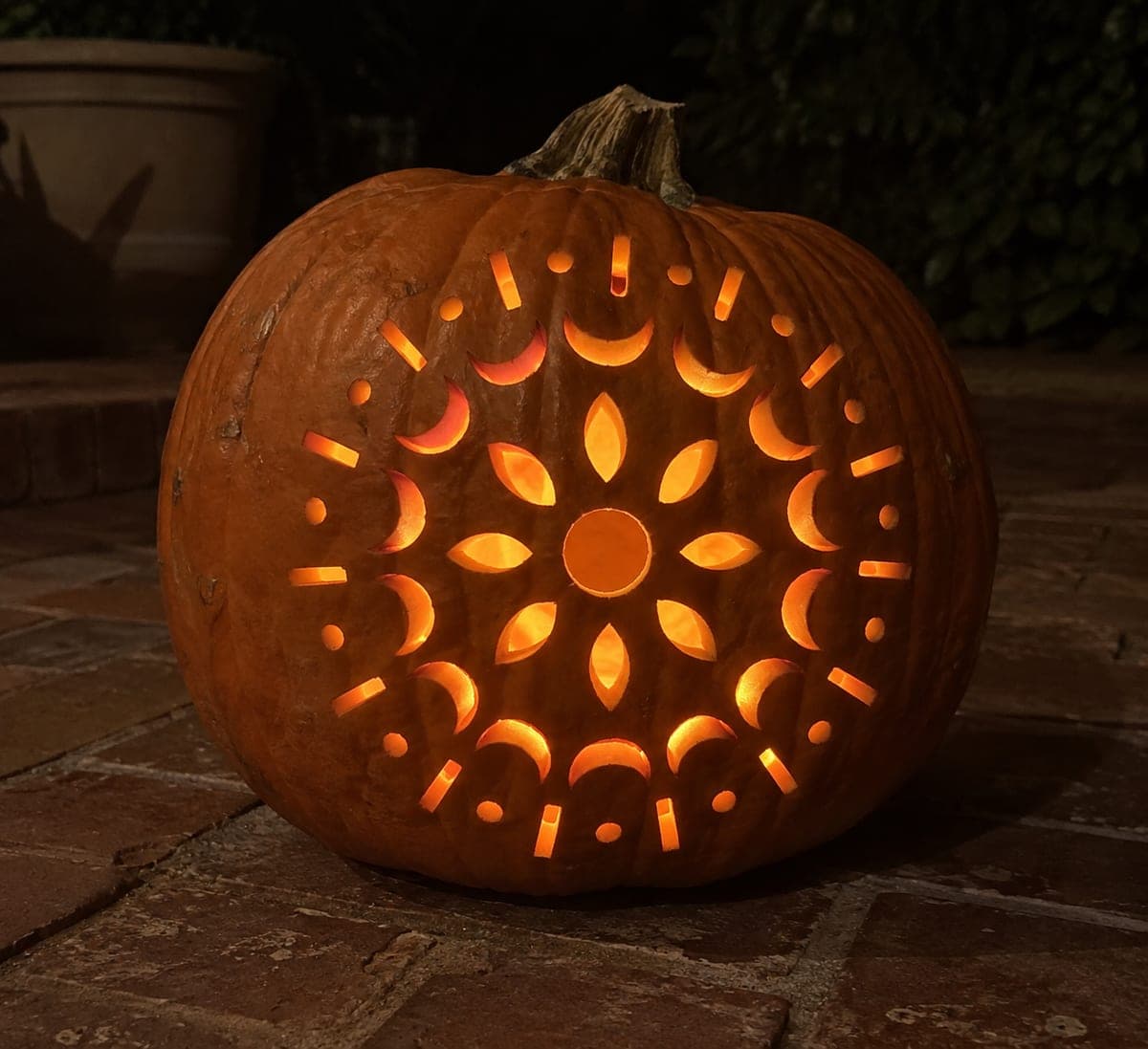 Three-Ring Detailed Mandala Pumpkin Glowing at Night