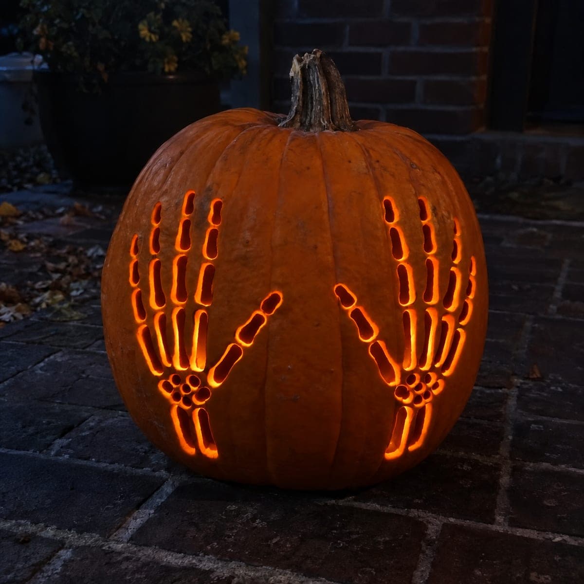 Two Skeleton Hands Pumpkin Reaching Upward