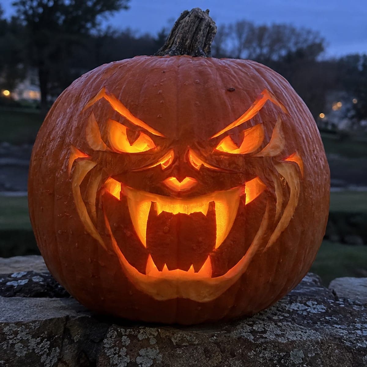 Ferocious Demon Face Pumpkin With Curved Fangs