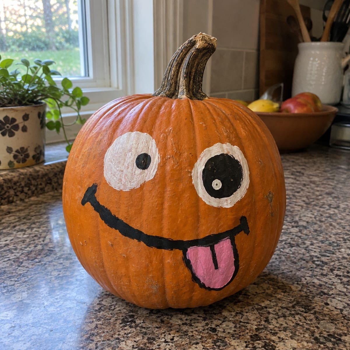 Silly Tongue-Out Emoji Painted Pumpkin Face