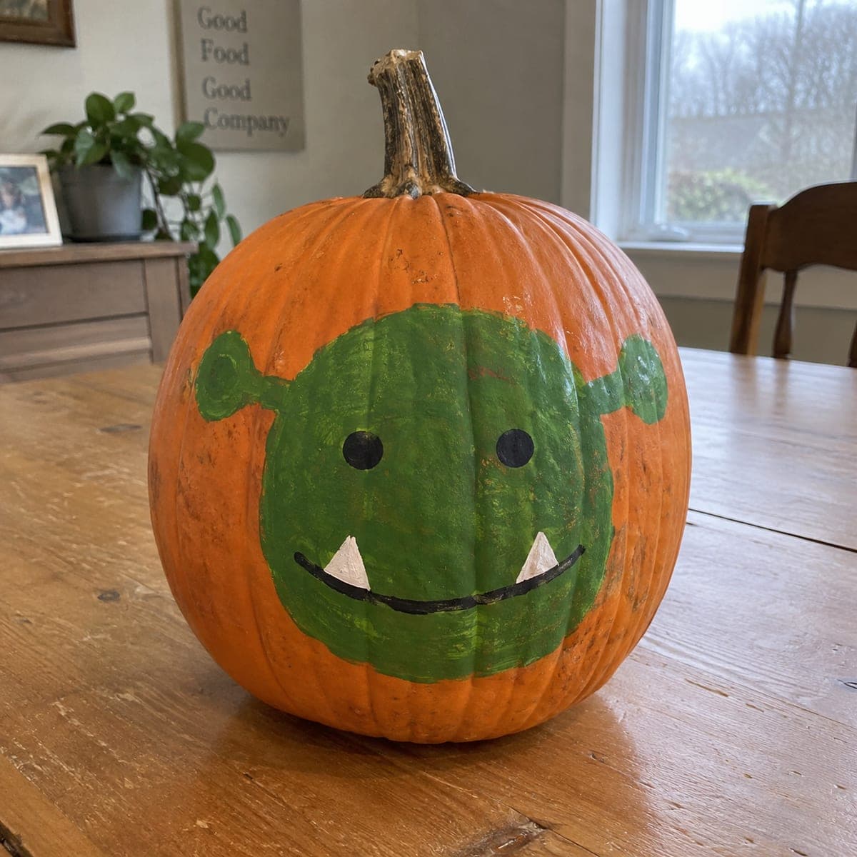Green Ogre Face Painted Pumpkin for Kids