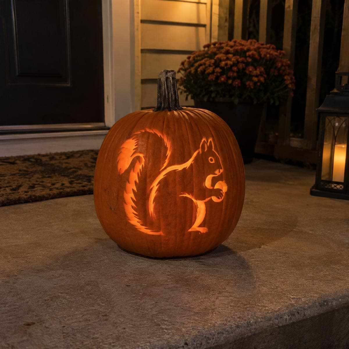 Squirrel Holding Acorn Jack-O-Lantern Front Porch