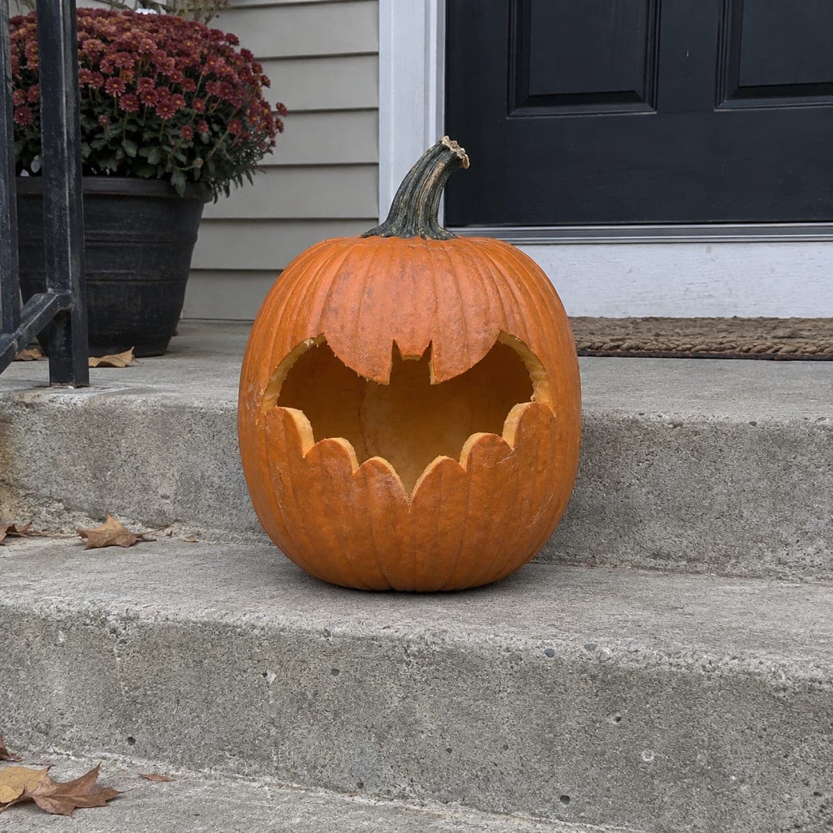 Batman Logo Jack-O-Lantern Cutout on Doorstep